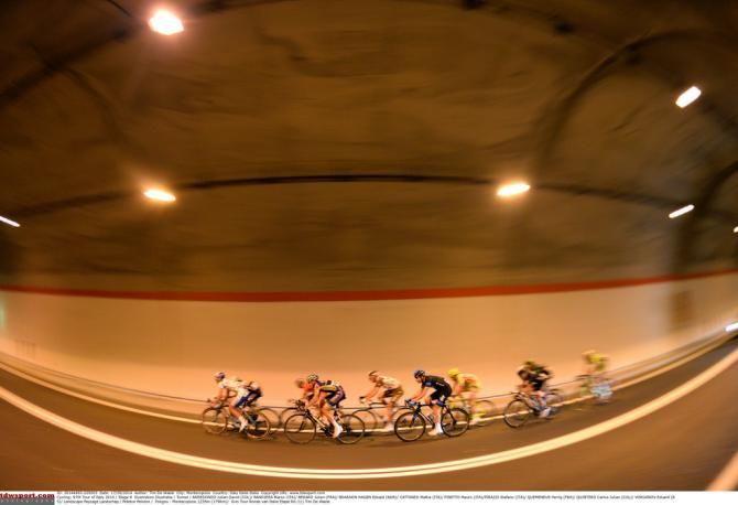 The break riding through a well lit tunnel