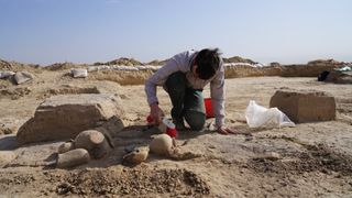 A person works at an excavation site