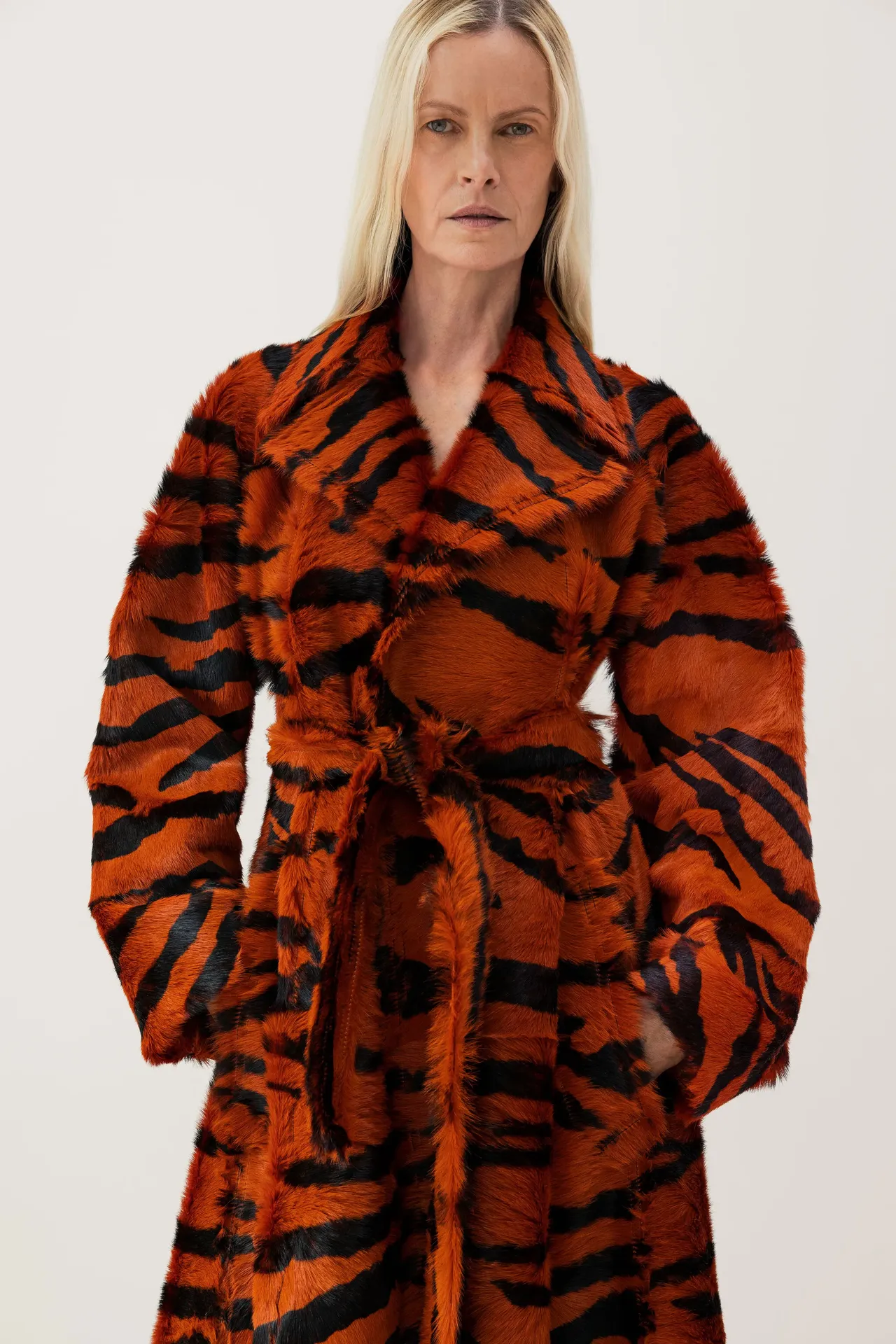 A model wearing a tiger print in Bottega Veneta Resort 2023 collection