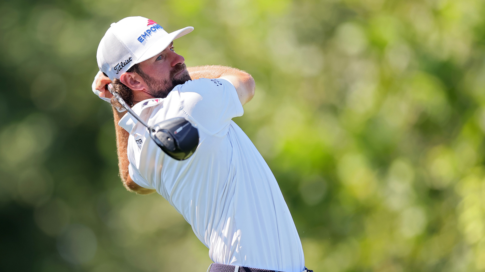 Cameron Young hits a tee shot