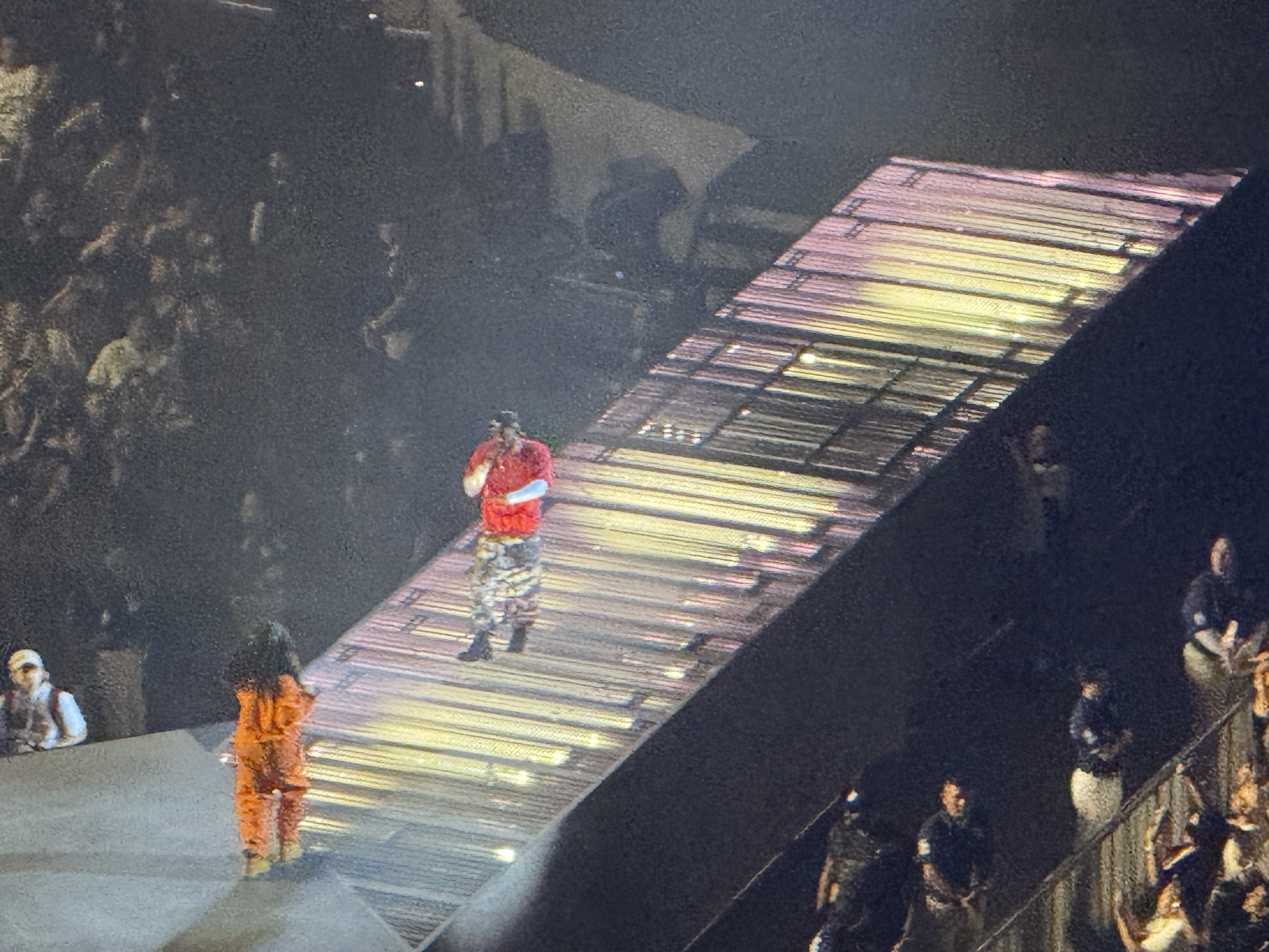 Concert photos captured with the iPhone 16 Pro using the telephoto camera.