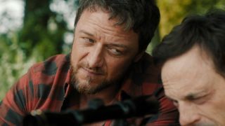 James McAvoy looking at Scoot McNairy in Speak No Evil. 