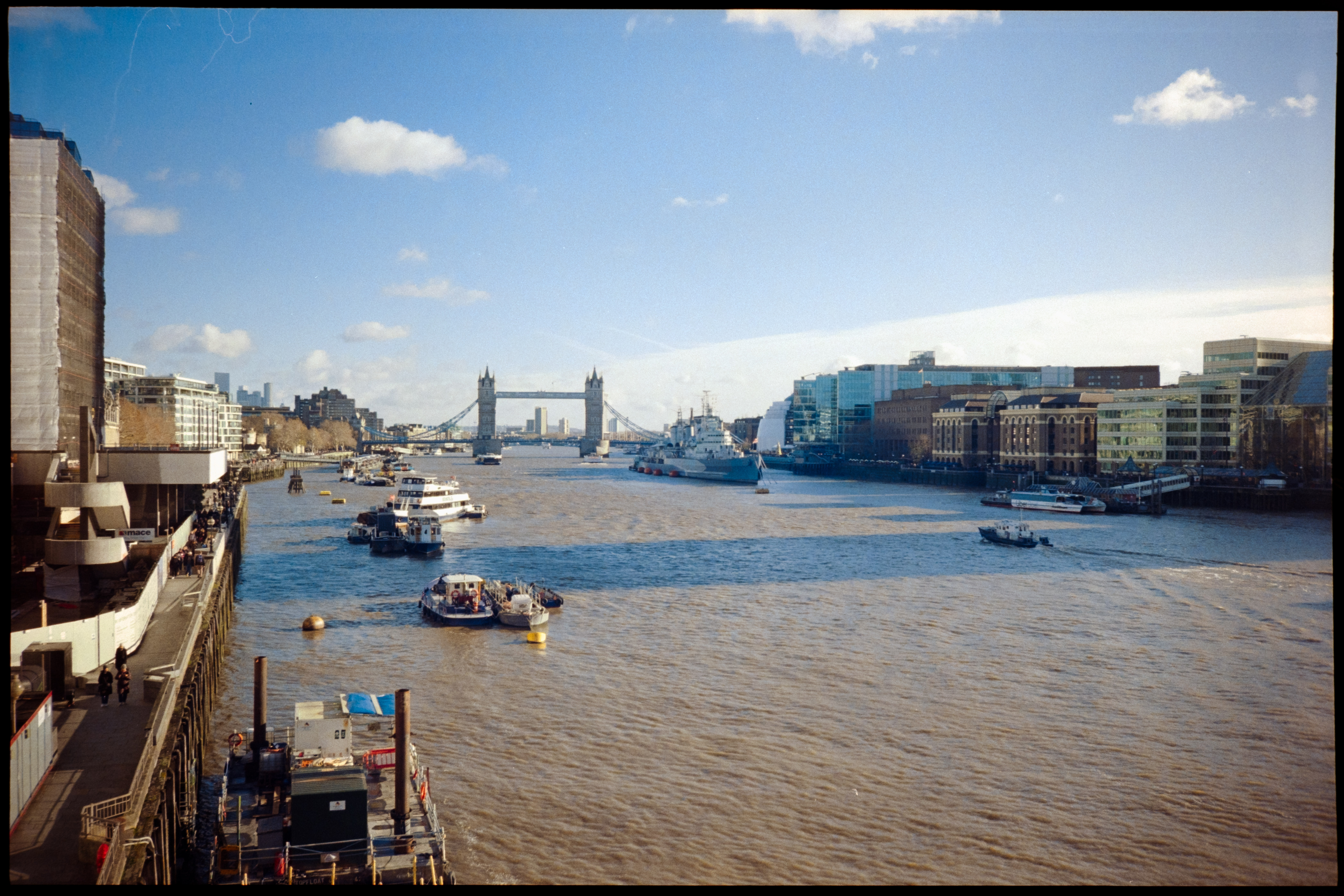 View over the river Thames on a sunny day with Towerbridge in the distance