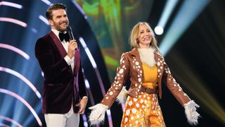 Joel Dommett with Natalie Appleton after being unmasked as Fawn on The Masked Singer UK season 4