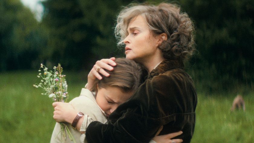 L-R: Lady Eileen Brent (Mia McKenna-Bruce) and Lady Caterham (Helena Bonham Carter) hug in a scene from Netflix's "Agatha Christie's Seven Dials"