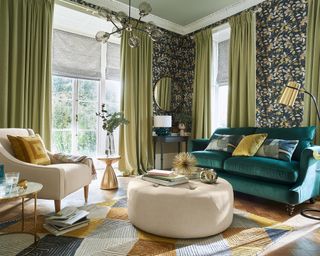Green living room by John Lewis and Partners with printed wallpaper and green curtains