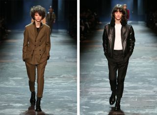 A front on view of two separate models on the catwalk, left in brown jacket and trousers, the right a leather jacket and white t shirt