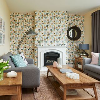 living room with wallpaper on wall and sofa