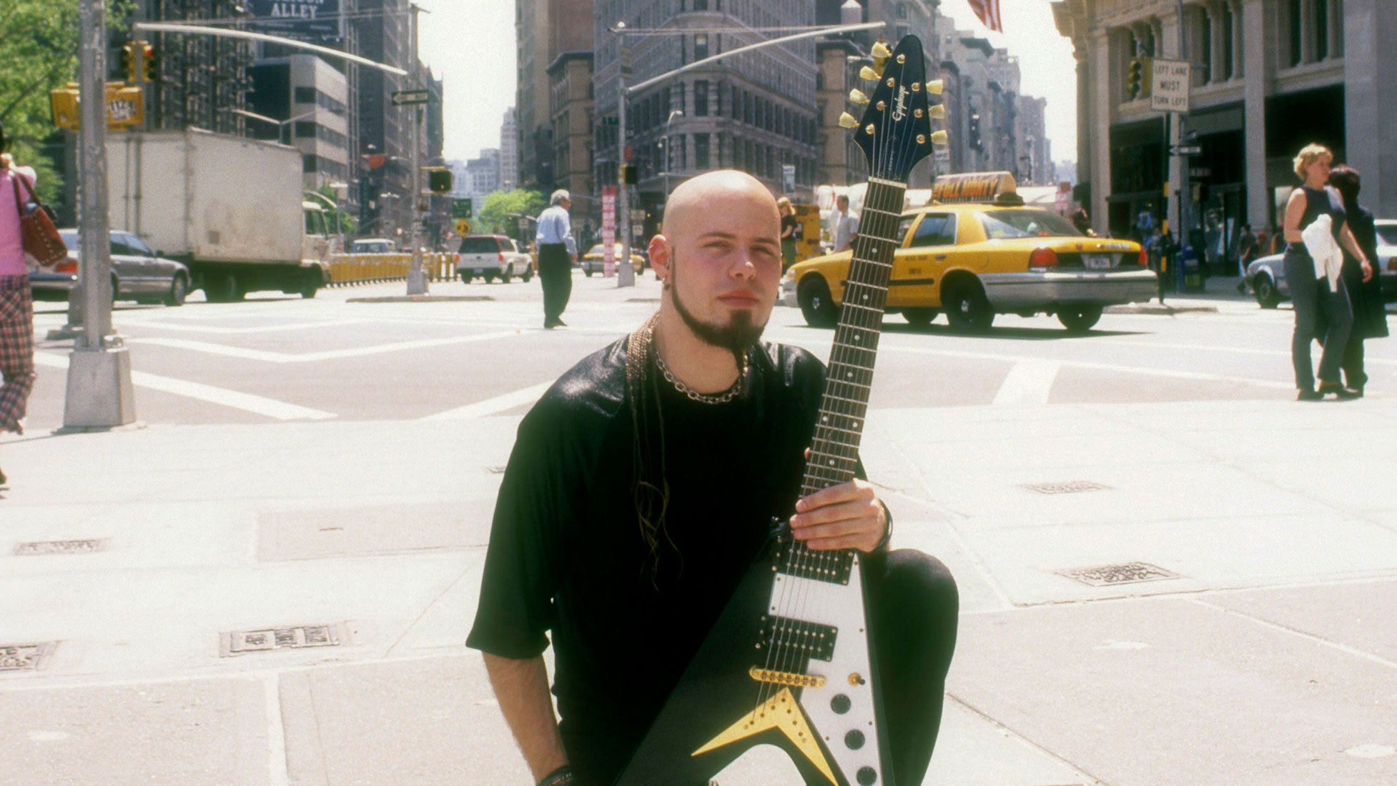 Guitarist C.J. Pierce of the band Drowning Pool appears in a portrait with his Gibson Flying V model guitar on May 10, 2001 in the Flatiron District of New York City