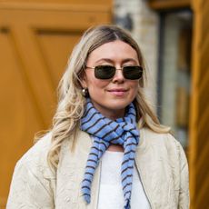 blonde woman wearing sunglasses