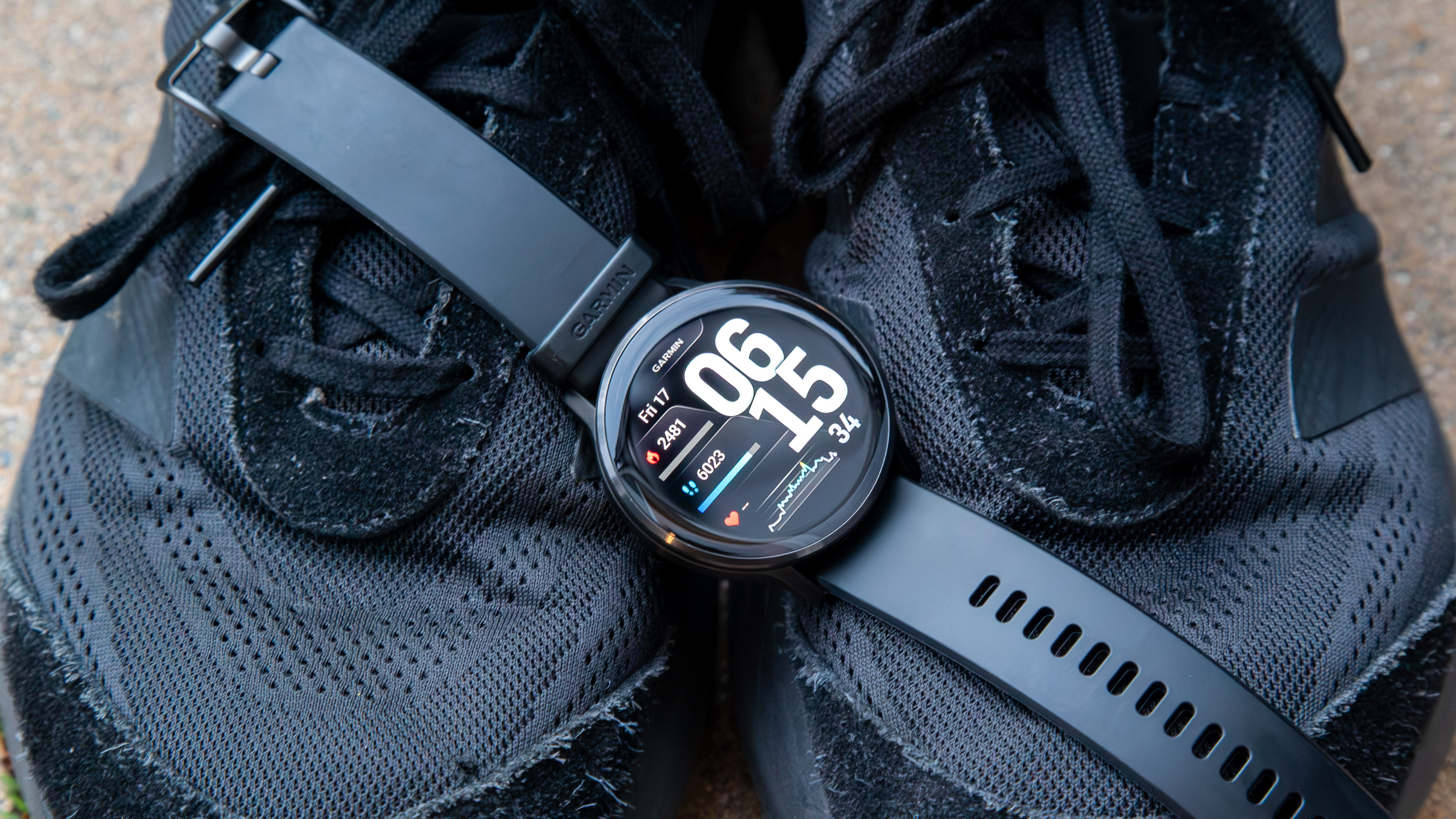 Garmin Venu 4 on black shoes