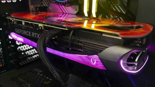 Zotac RTX 4070 Ti inside gaming PC with purple RGB lighting