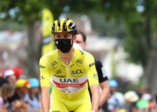Tadej Pogačar wears a mask at the Tour de France 