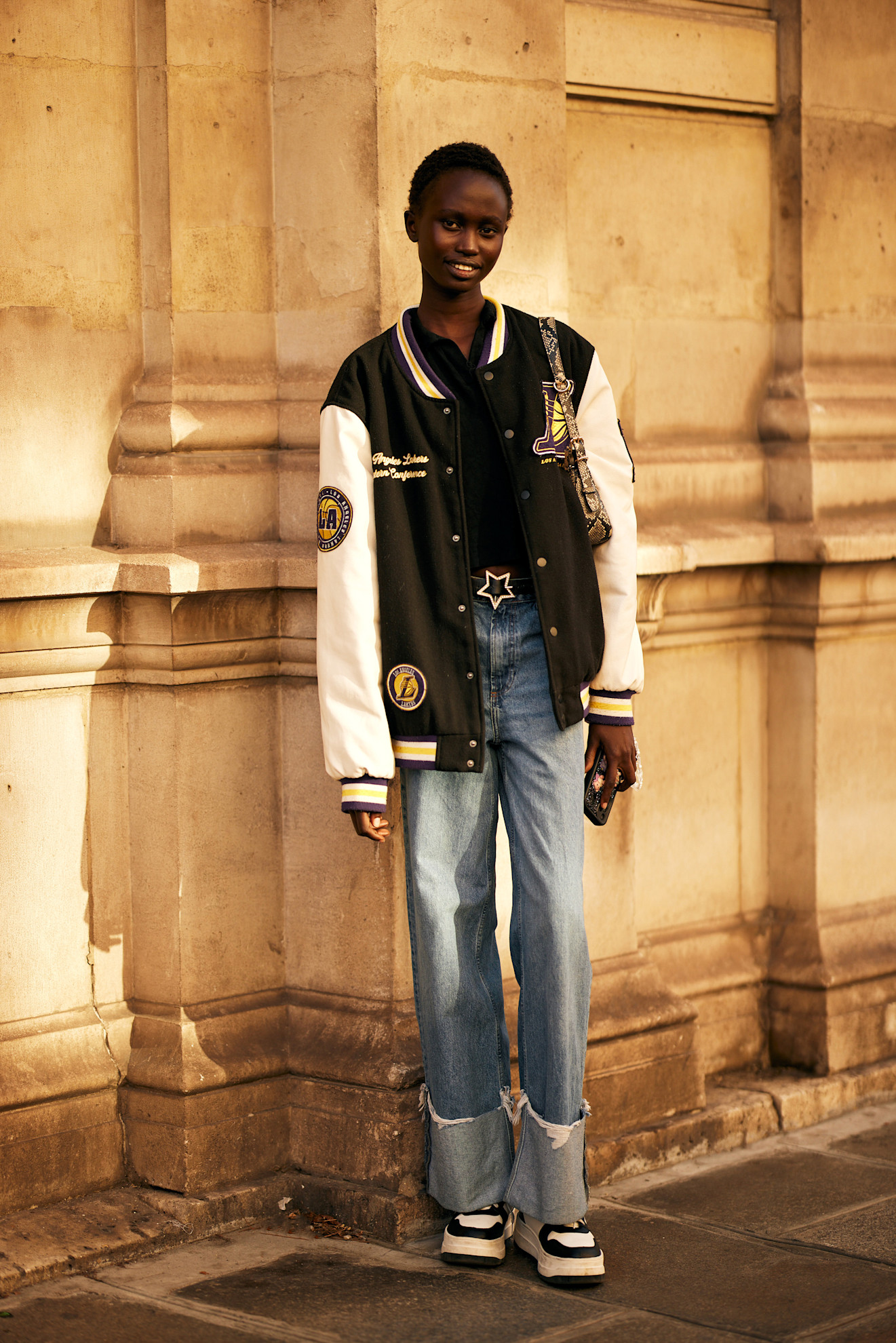 women at fashion week wearing their best cuffed jeans