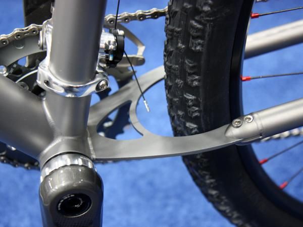 Funk Cycles' La Ruta full-suspension titanium frame features a flexible titanium plate behind the bottom bracket shell instead of a conventional main pivot.