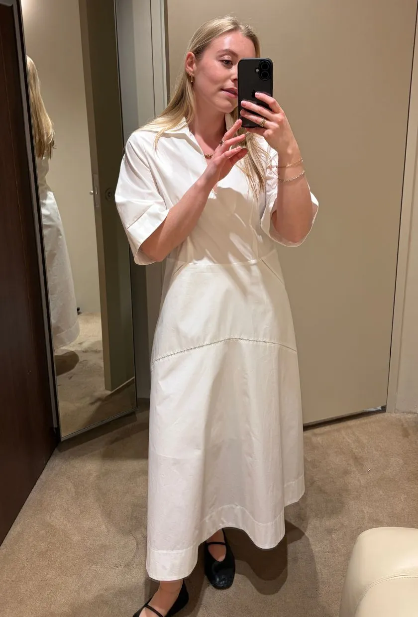 Florrie wears COS' embroidered pima cotton midi dress (&pound;119)