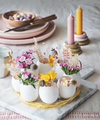 egg centerpiece wreath with cracked egg shells and small floral details