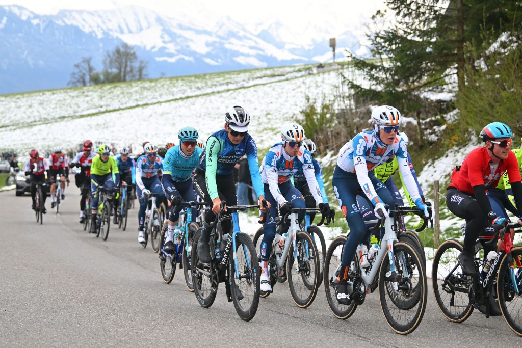 FRIBOURG SWITZERLAND APRIL 24 LR Jaakko Hanninen of Filand and Decathlon AG2R La Mondiale Team and Gijs Leemreize of The Netherlands and Team dsmfirmenich PostNL compete during the 77th Tour De Romandie 2024 Stage 1 a 1657km stage from Chateau dOex to Fribourg UCIWT on April 24 2024 in Fribourg Switzerland Photo by Luc ClaessenGetty Images