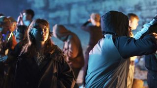 Kelly, played by Eva Morgan, makes her way through an illegal rave in Channel 4 drama The Gathering