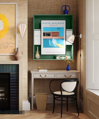 Greige desk in living room alcove with black fireplace and David Hockney wall art by Original BTC