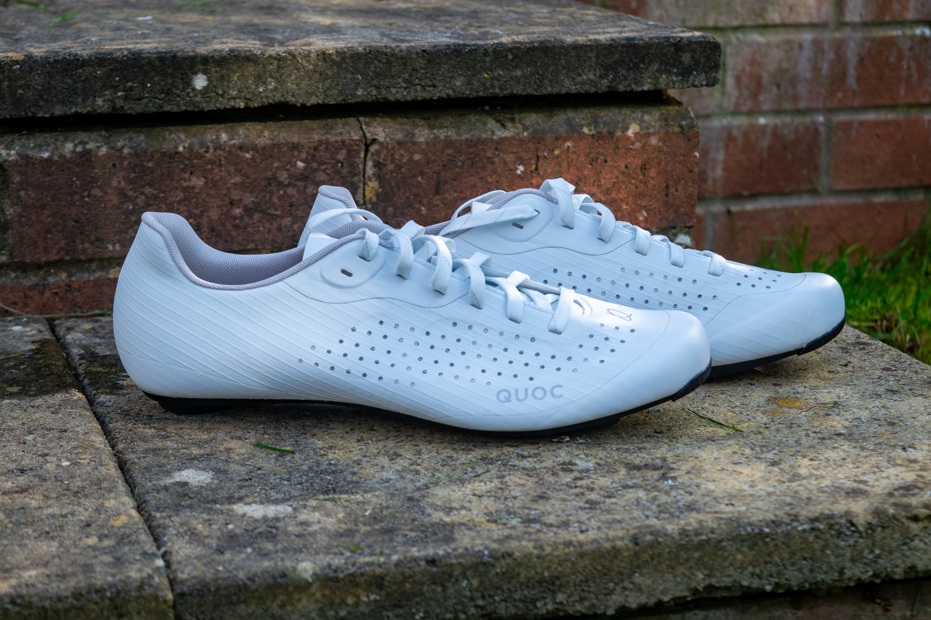 A pair of white Quoc M Pro Lace shoes