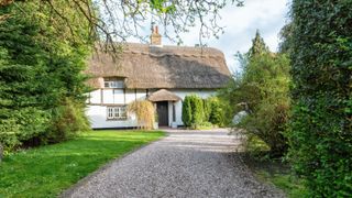 Grade 2 listed country thatched cottage built in the 15th Century