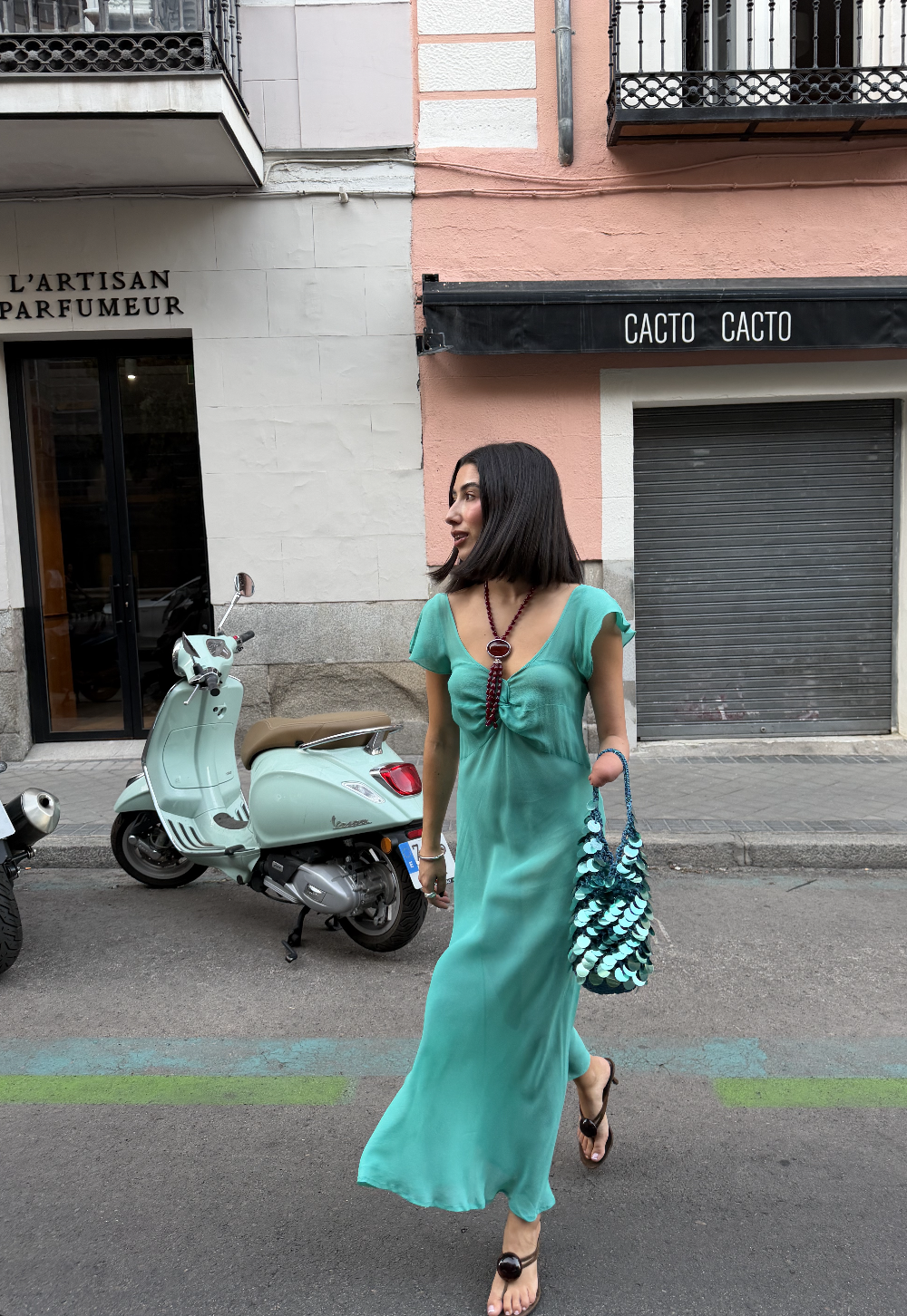 April Lockhart wearing a sheer dress
