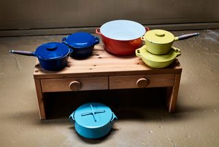 Vintage Scandinavian pots and pans on low console