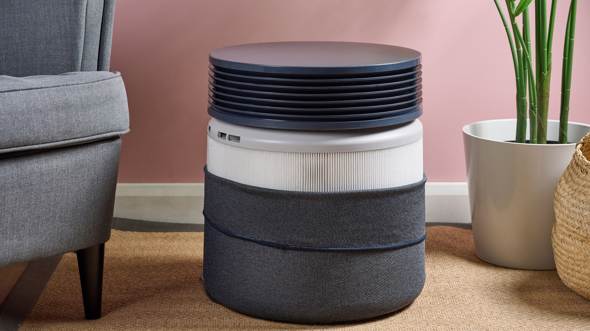 The fabric pre-filter of the Blueair Blue Signature air purifier has been partially rolled down.