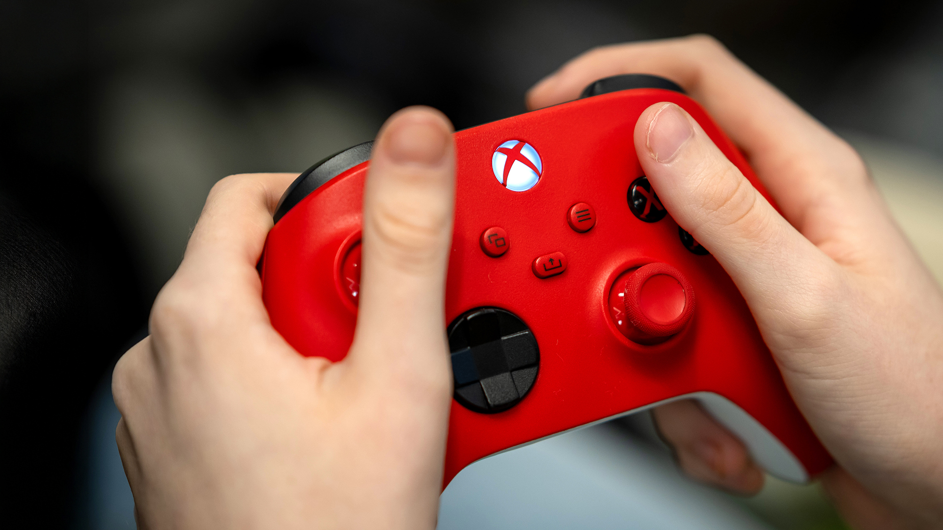 Playing with a red Xbox Wireless Controller