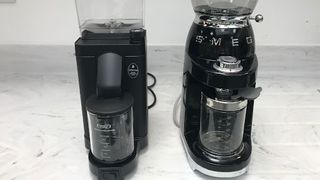 the Moccamaster and Smeg coffee grinder on a marble countertop
