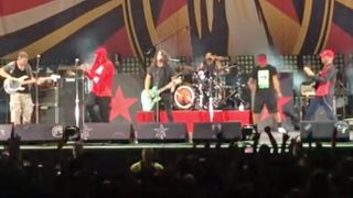 A picture of Dave Grohl on stage with Prophets Of Rage