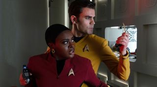 The Noonien-Singh, Kirk and Uhura love triangle is a set up for the Big Kiss from The Original Series