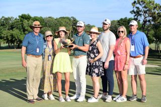 Burns with his family after winning the Valspar Championship