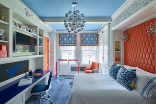 Kids bedroom in blue and orange by Philip Thomas