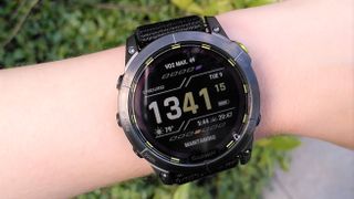 Woman's wrist wearing Garmin Enduro 2 watch