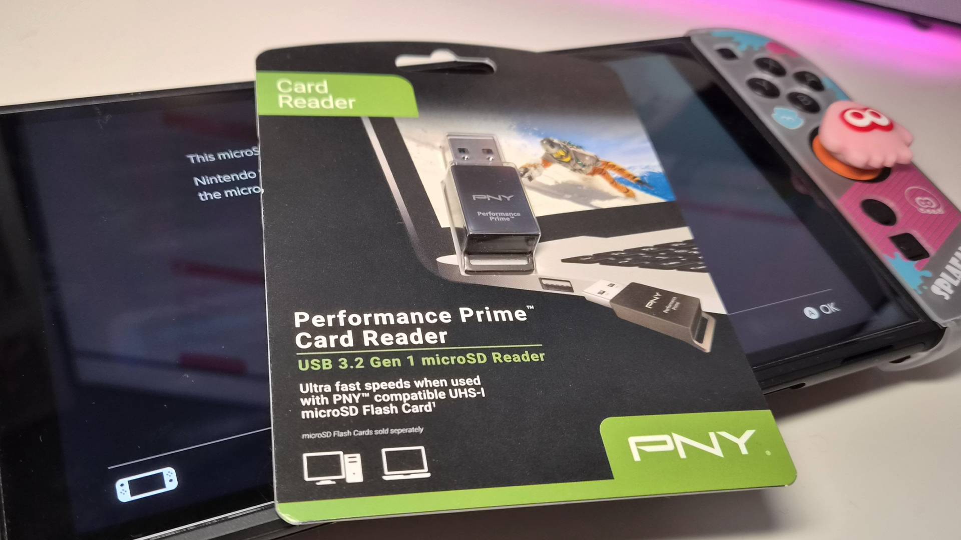 Photo of the PNY Performance Prime Card Reader sitting on a Nintendo Switch 2.