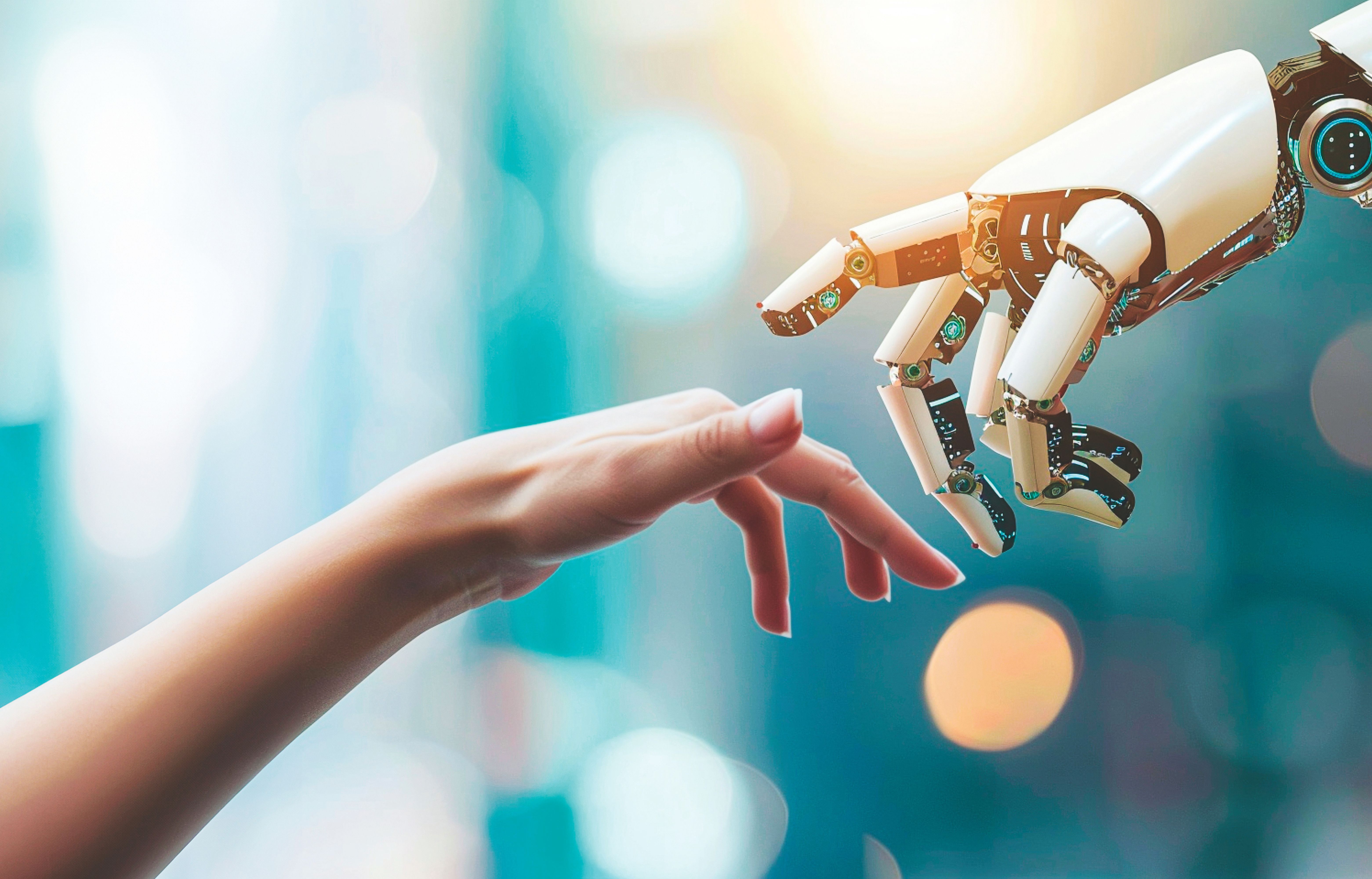 robot hand and human hand reaching out