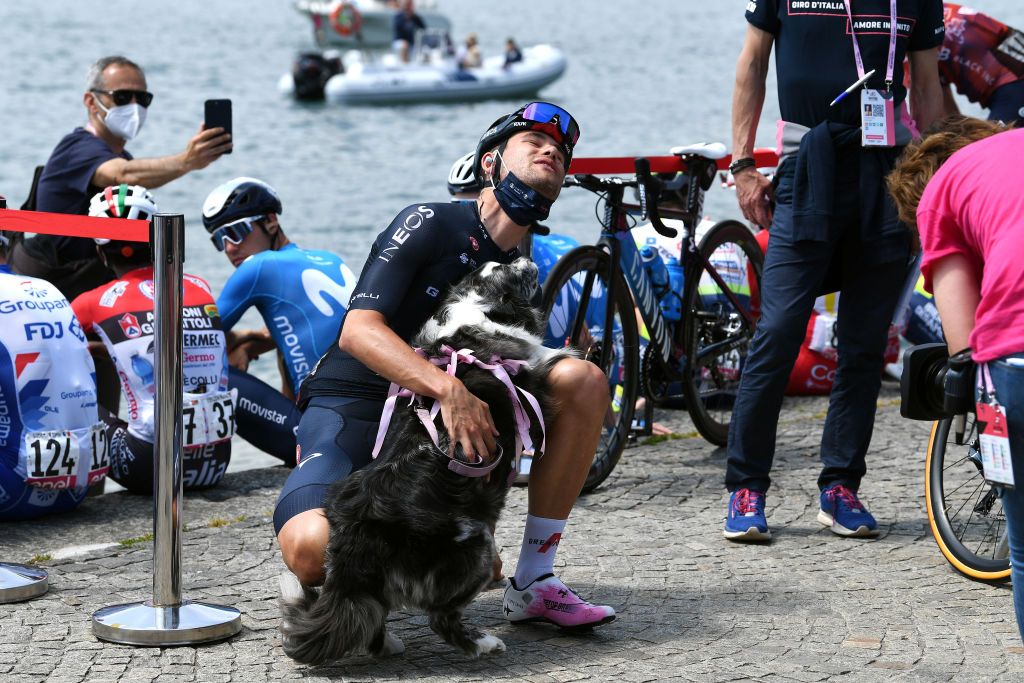 VALLE SPLUGA ALPE MOTTA ITALY MAY 29 Filippo Ganna of Italy and Team INEOS Grenadiers and his dog Mia in Maggiore Lake at start in Verbania City during the 104th Giro dItalia 2021 Stage 20 a 164km stage from Verbania to Valle Spluga Alpe Motta 1727m UCIworldtour girodiitalia Giro on May 29 2021 in Valle Spluga Alpe Motta Italy Photo by Tim de WaeleGetty Images