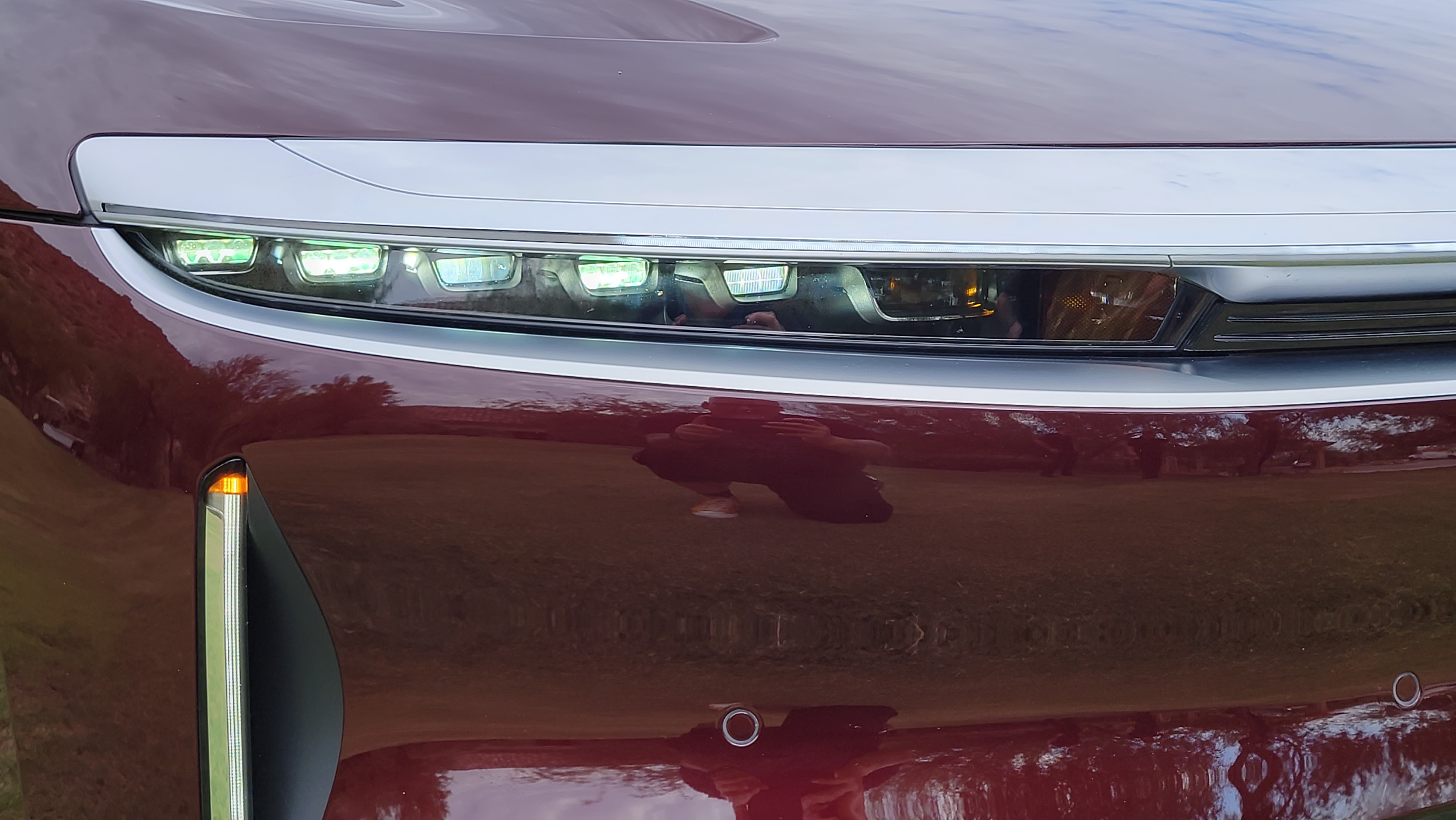 Close-up of slender headlights on Lucid Air