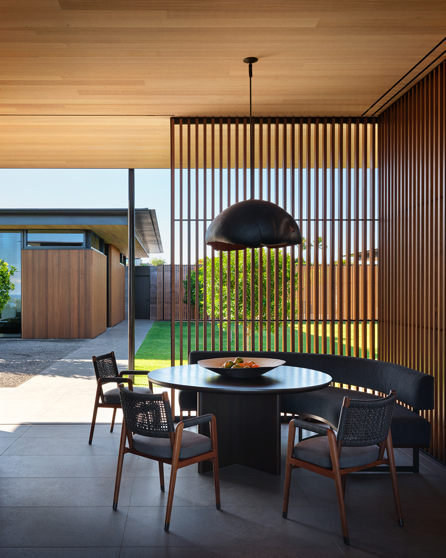 Hawaii house by oslon kundig and leverone design by the sea, tall ceilings, contemporary spaces and art work, and lots of glazing