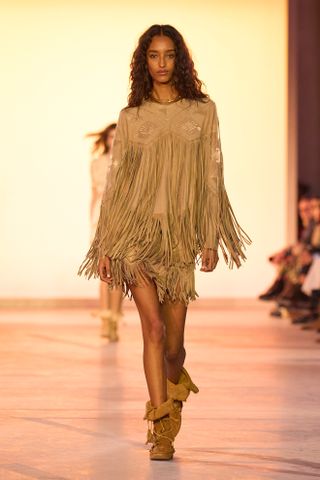 woman wearing boho shoes on the isabel marant spring 2025 runway