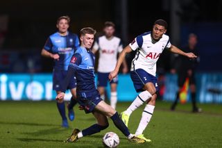 Josh Knight of Wycombe Wanderers and Carlos Vinicius of Tottenham Hotspur are seen in action during the Emirates FA Cup fourth round match between Wycombe Wanderers and Tottenham Hotspur at Adams Park. (Final Score; Wycombe Wanderers 1:4 Tottenham Hotspur)