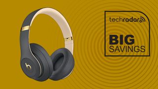 Beats Studio Pro Wireless Noise Cancelling Headphones in Black and Gold on yellow background with big savings text 