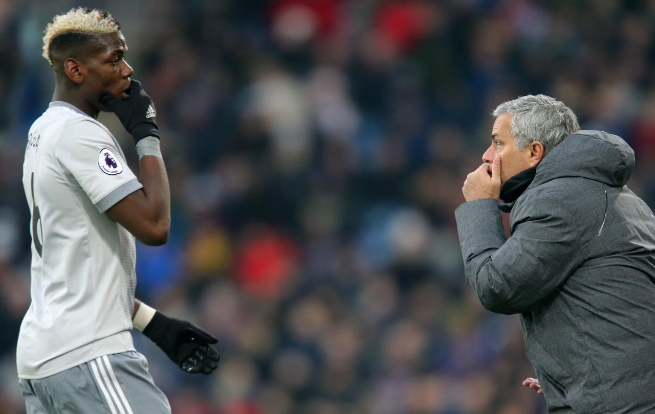 Paul Pogba of Manchester United talks with manager Jose Mourinho during the Premier League match against Burnley at Turf Moor, January 2018