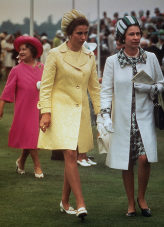 Queen Elizabeth II (right) with Princess Anne (centre) and the Queen Mother (1900 - 2002) at Royal Ascot, 16th June 1970