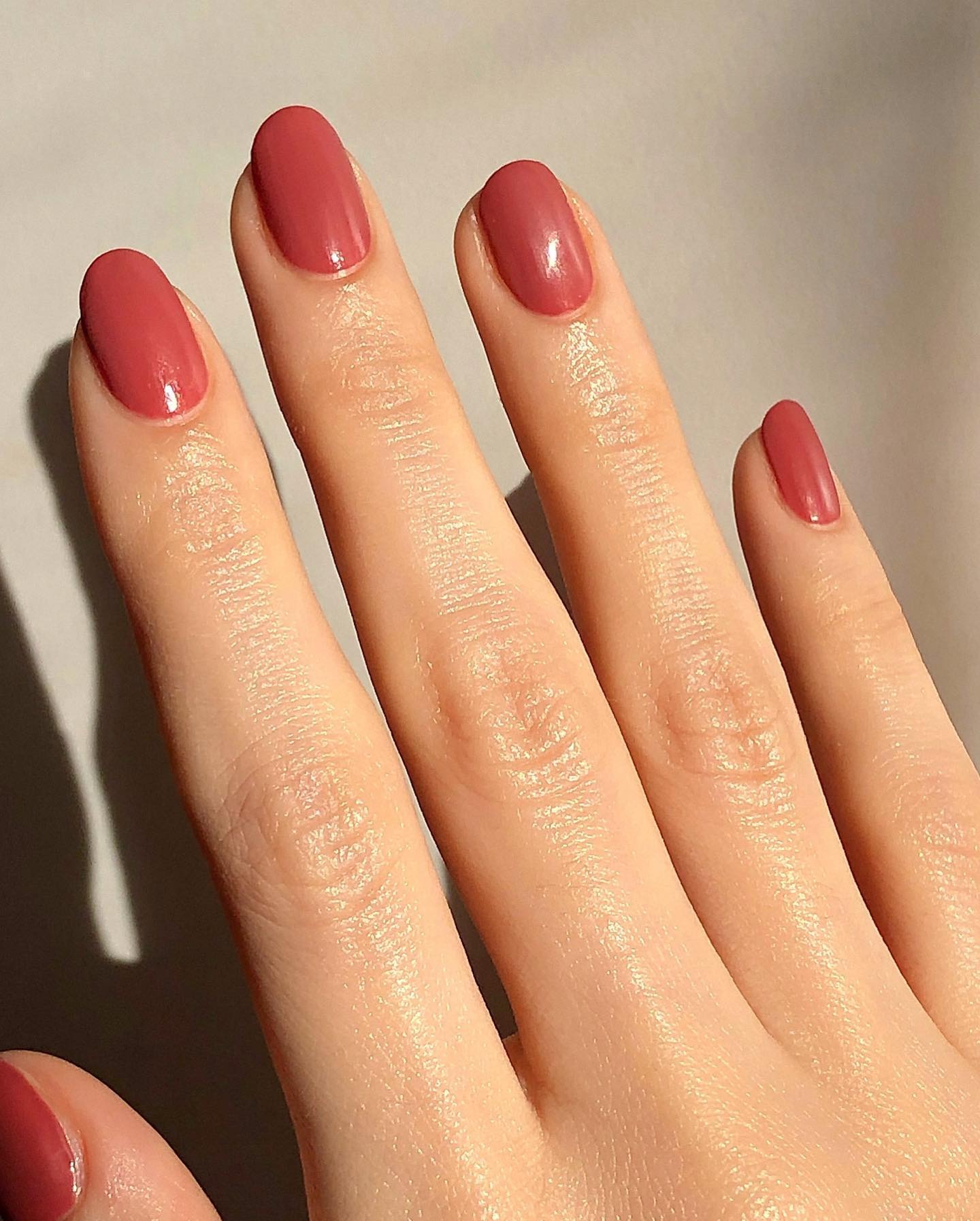 Photo of @pink_oblivion wearing desert rose nail polish