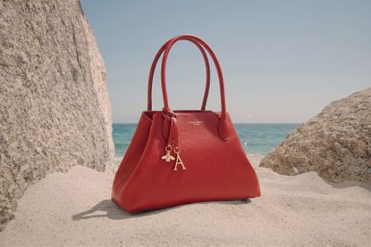red aspinal bag on beach