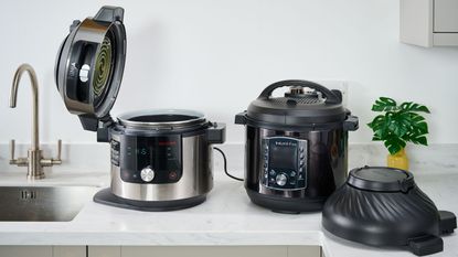 Instant Pot and Ninja Foodi next to eachother on a kitchen counter