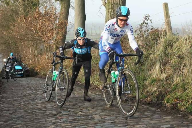 Gabriel Rasch has a little help from Geraint Thomas as he tests out his new Pinarello bike on the climbs
